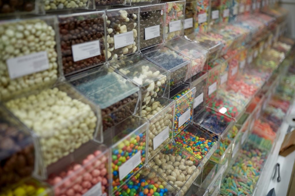 Inicio 3 different sweets in boxes at candy shop